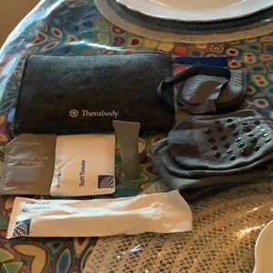 Travel bag kit includes sleeping socks mask tooth brush chap stick tissu…